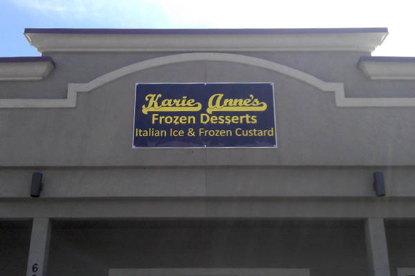 a Karie Anne's Frozen Desserts sign above a storefront